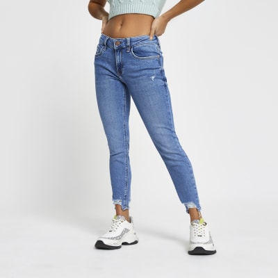Petite blue Molly rip hem mid rise jeggings
