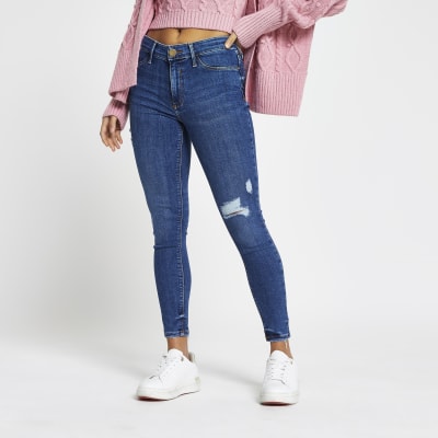 Petite Blue Molly Ripped Mid Rise Skinny Jean | River Island
