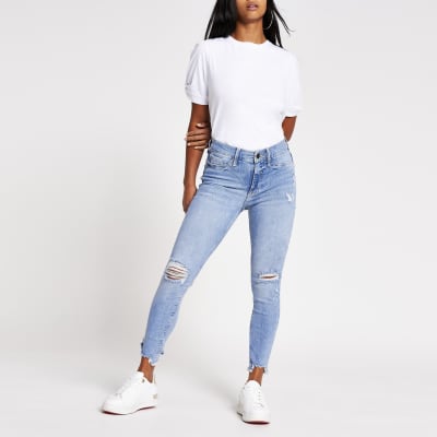 petite blue ripped skinny jeans