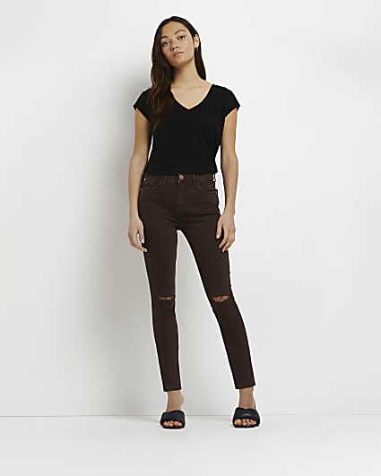 Petite brown ripped mid rise skinny jeans