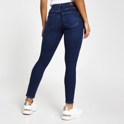 petite dark blue skinny jeans