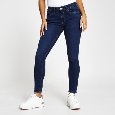 Petite dark blue Amelie super skinny jeans | River Island