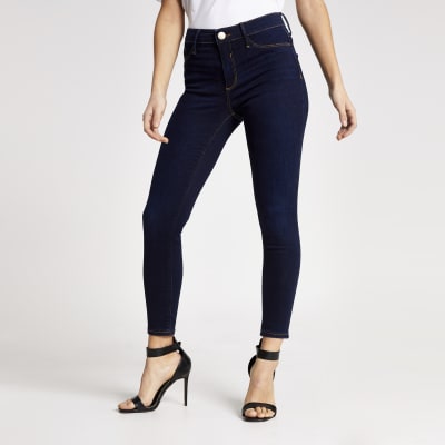 Petite dark blue Molly mid rise jeggings | River Island