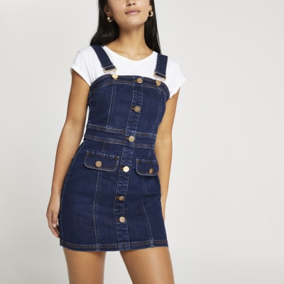 Petite denim mini dungaree dress | River Island