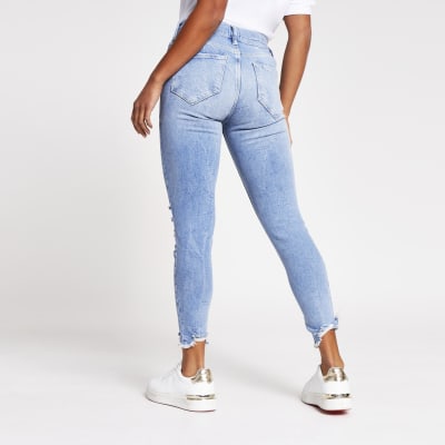 Petite light blue molly mid rise jegging