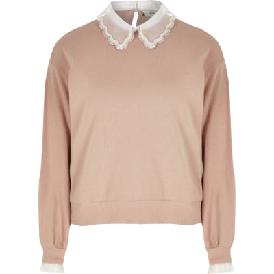 pink sweater with embellished collar