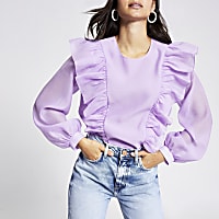 Petite purple ruffle front blouse