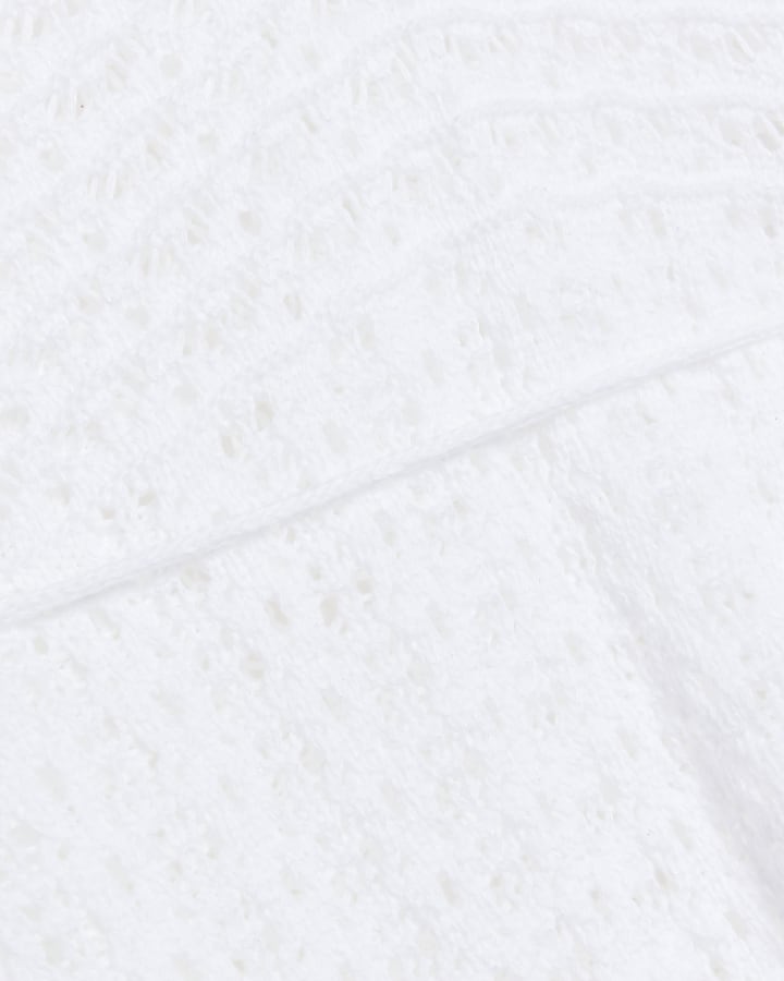 Petite white crochet long sleeve top