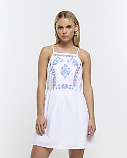 Petite white embroidered mini dress