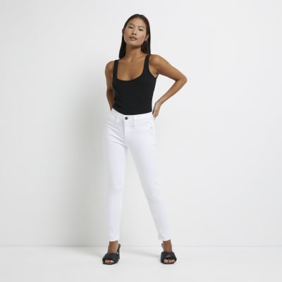 Petite white Molly mid rise skinny jeans River Island