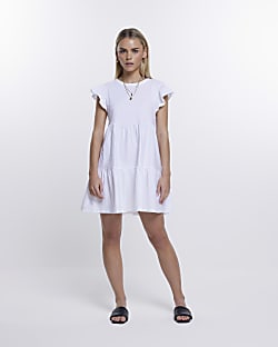 Petite white tiered mini dress