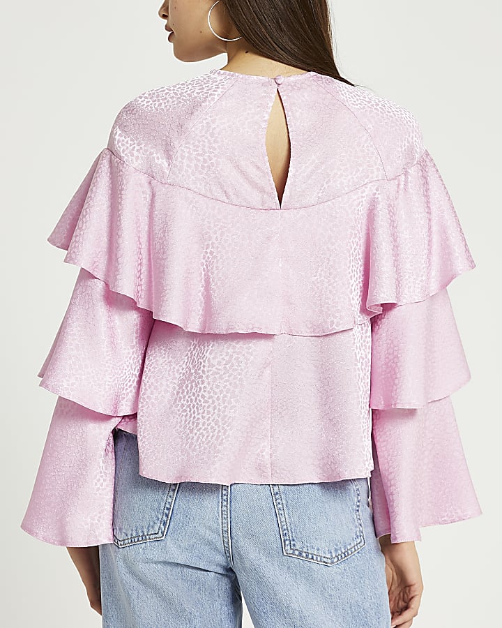 Pink animal print ruffle blouse top