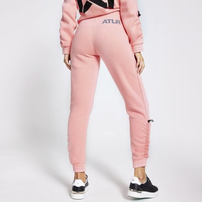 Pink 'ATLR' print ruched joggers