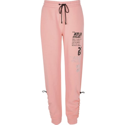 Pink 'ATLR' print ruched joggers