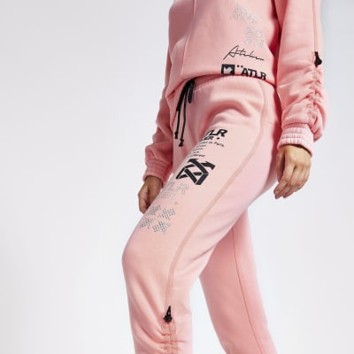 Pink 'ATLR' print ruched joggers