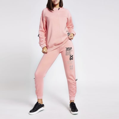Pink 'ATLR' print ruched joggers
