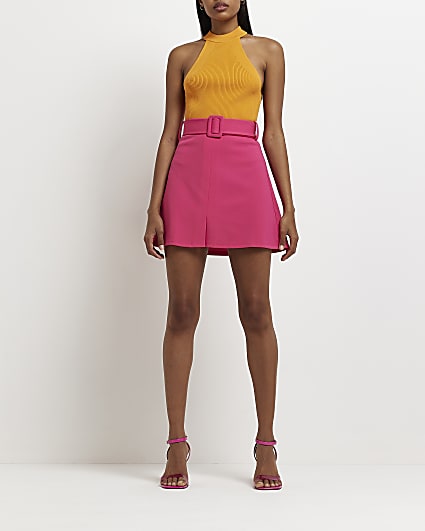 Pink belted mini skirt