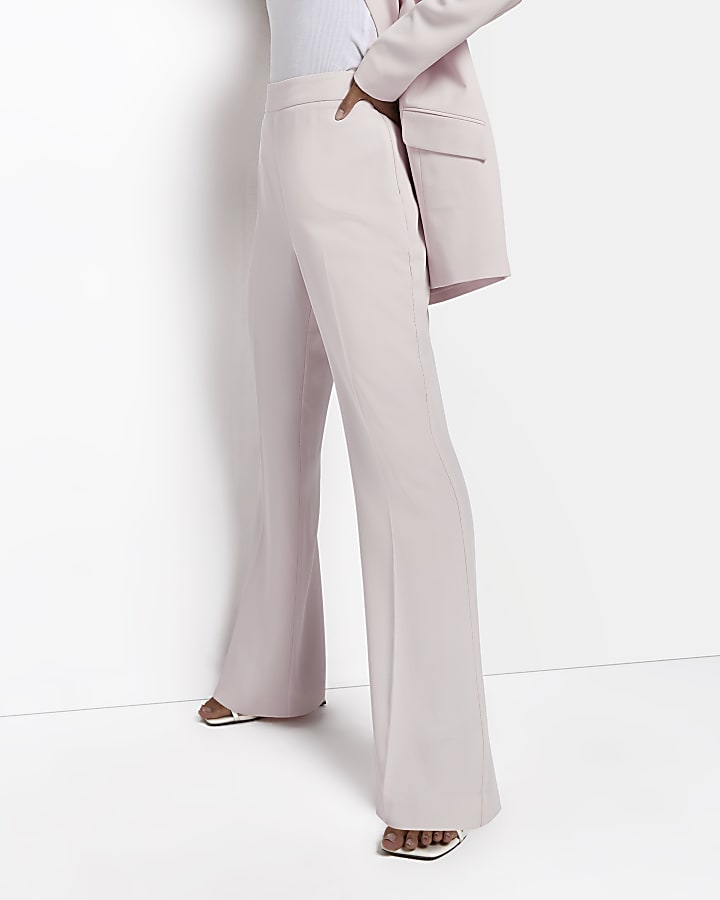 Pink flared trousers