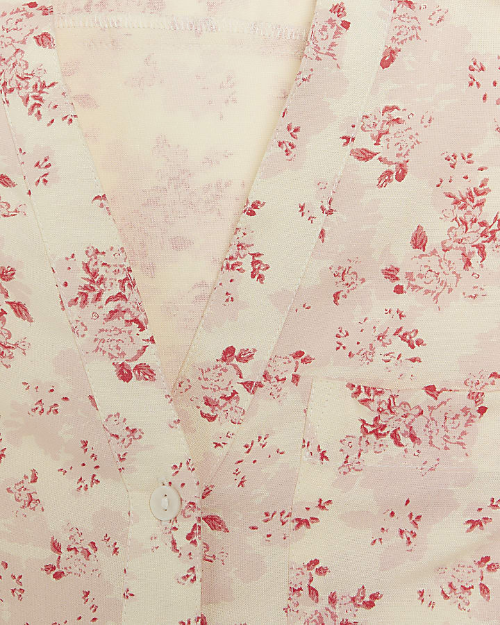 Pink floral print sleeveless shirt