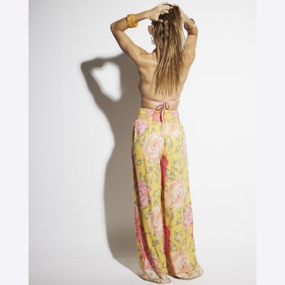 Pink floral wide leg beach trousers River Island