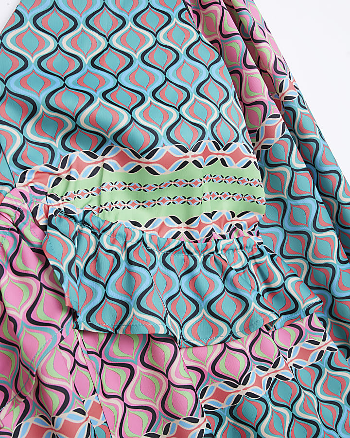 Pink geometric long sleeve playsuit