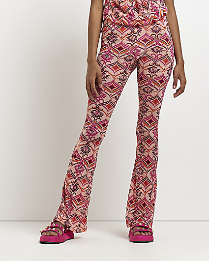 Pink geometric print flared trousers