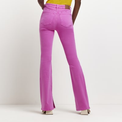 Pink high waisted flared jeans | River Island