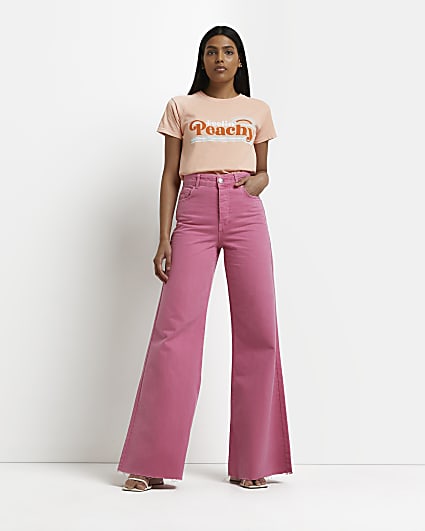 Pink high waisted ultra flared jeans