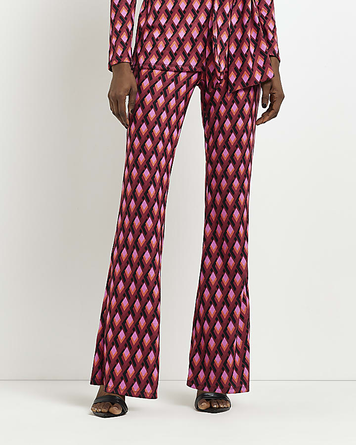 Pink jacquard printed flare trousers