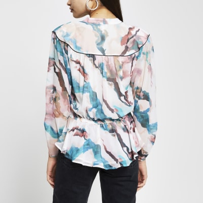 Pink long peplum wrap top