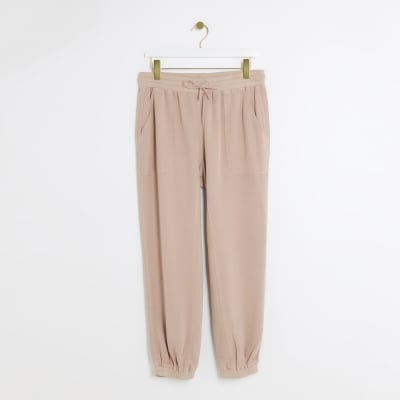 Pink lyocell cuffed joggers | River Island