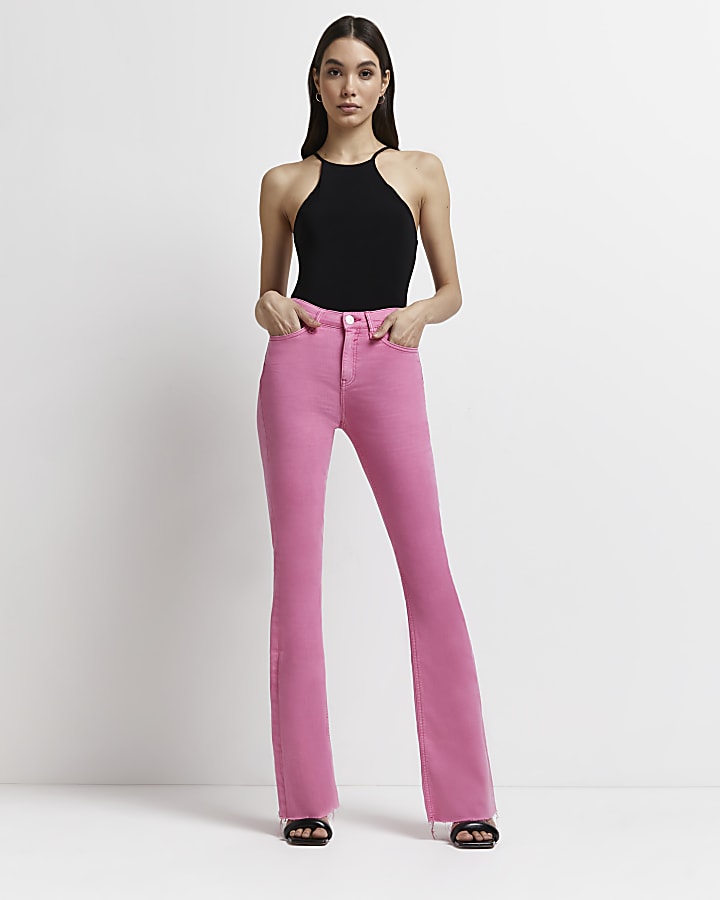 Pink mid rise flared jeans