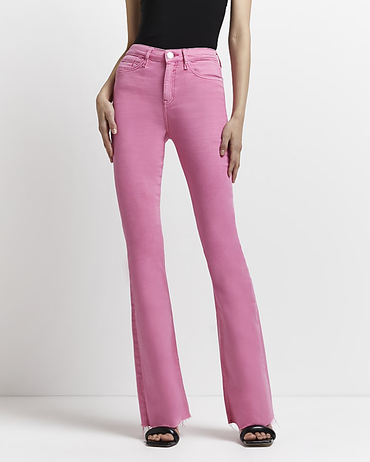 Pink mid rise flared jeans