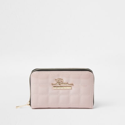 Pink patent quilted ziparound purse River Island