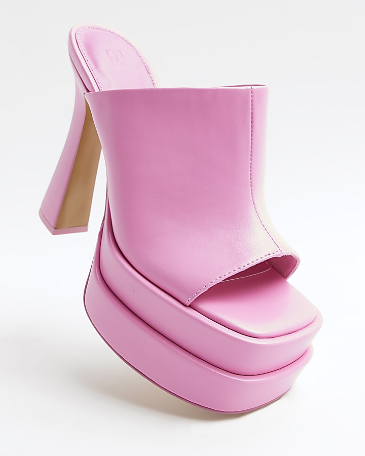 Pink platform heeled mules