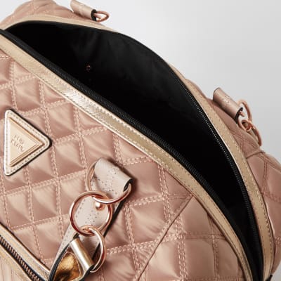 Pink quilted cross body weekend bag