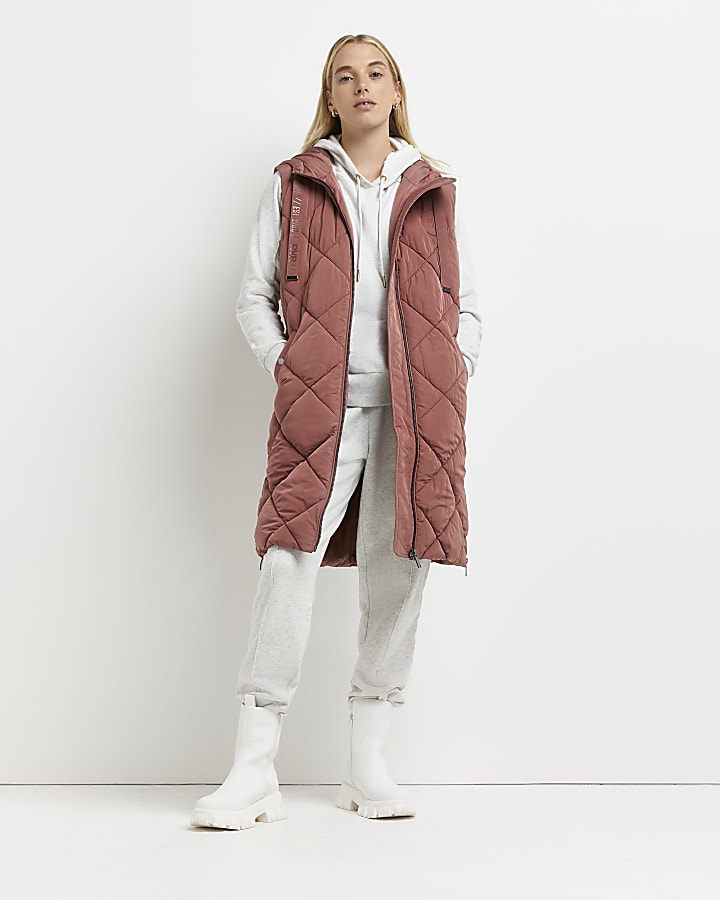 Pink quilted hooded gilet