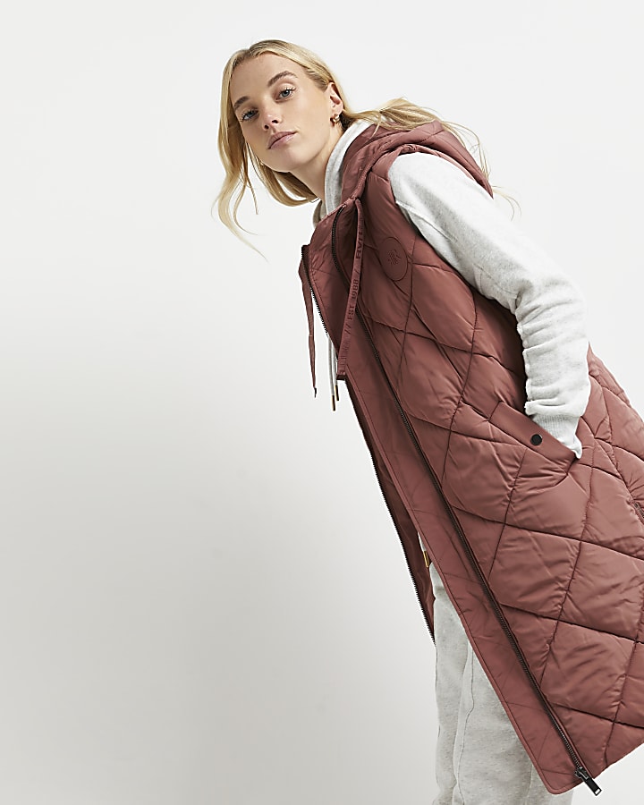 Pink quilted hooded gilet