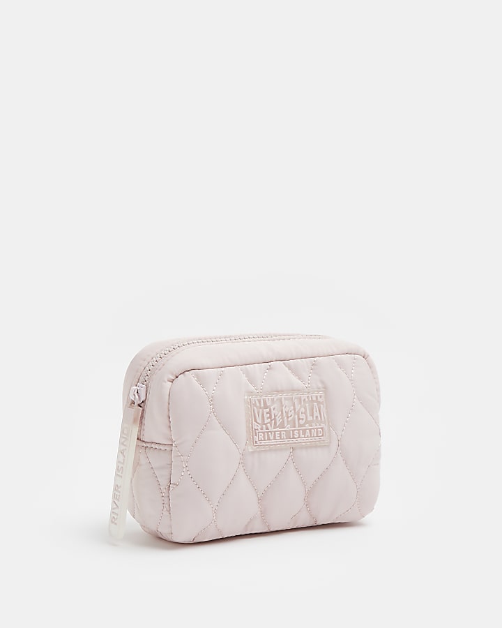 Pink quilted makeup bag