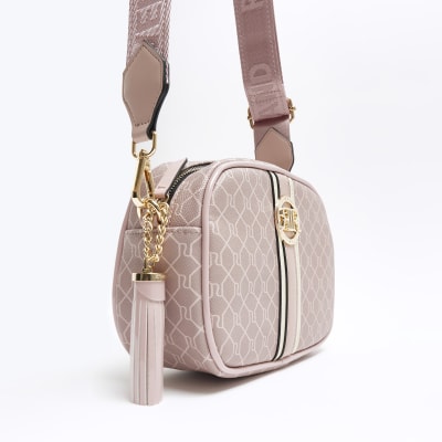 Pink RI monogram cross body bag River Island