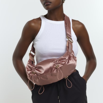 Pink satin utility shoulder bag River Island