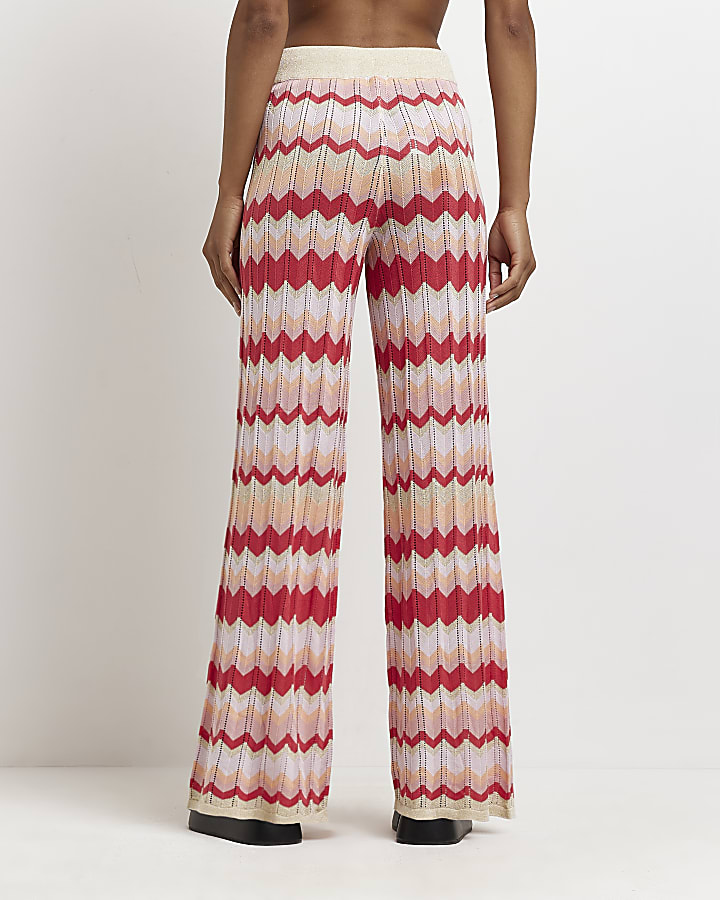 Pink striped flared trousers