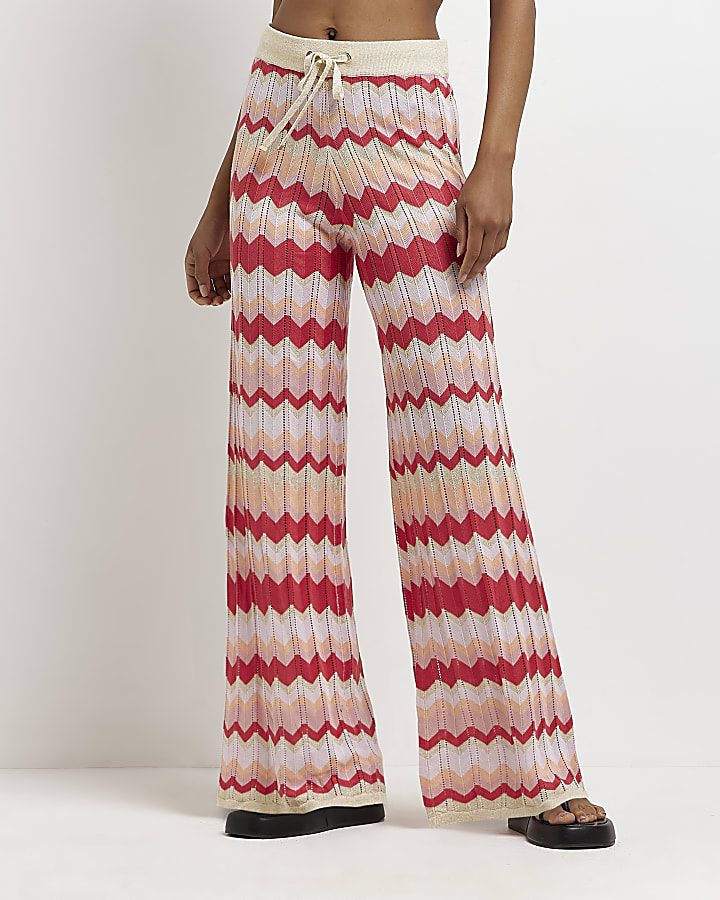 Pink striped flared trousers