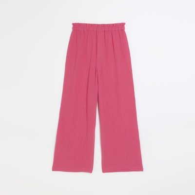 Pink textured wide leg trousers | River Island