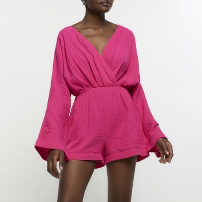 Pink textured wrap playsuit | River Island