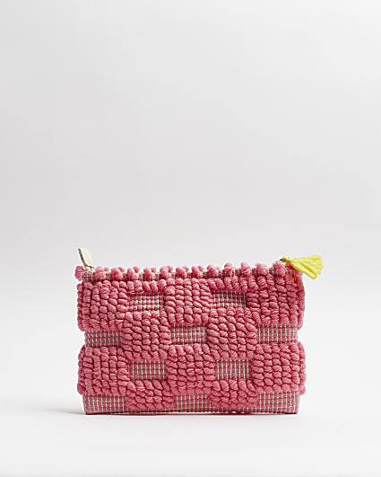 Pink woven clutch bag