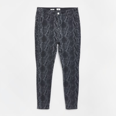 Plus black animal print skinny jeans