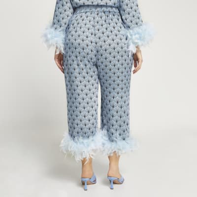 Plus blue feather print hem trousers