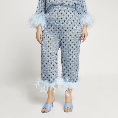 Plus blue feather print hem trousers
