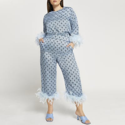 Plus blue feather print hem trousers